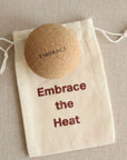 Embrace Cork Massage Ball with branded cotton drawstring pouch for storage and travel.