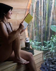 The Sauna Hat - Embrace The Heat - Reading book in the sauna