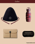 Embrace Everyday Essentials Sauna Set in Ember, featuring a merino wool sauna hat, matching bottle sleeve, phone pouch, and reusable ice pack.